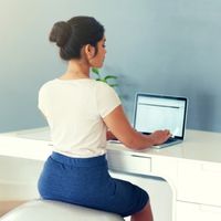 woman sitting infront the computer